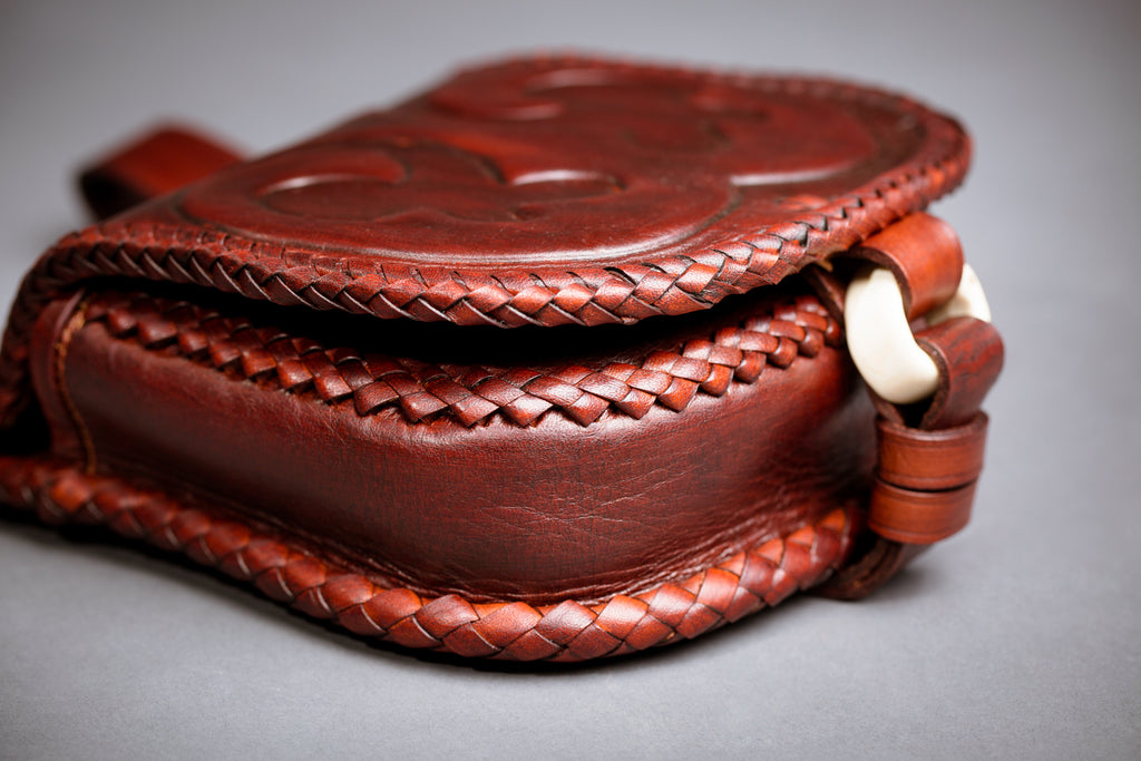 Why traditional folk art in leathercraft is so challenging?
